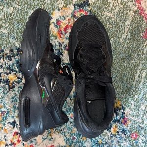 Holographic and black Nike shoes, size 11 (womans). Worn twice. No damage.